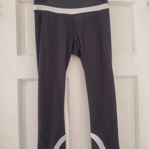 Lululemon Run: Inspire Crop Black / White leggings, back pocket, size 4